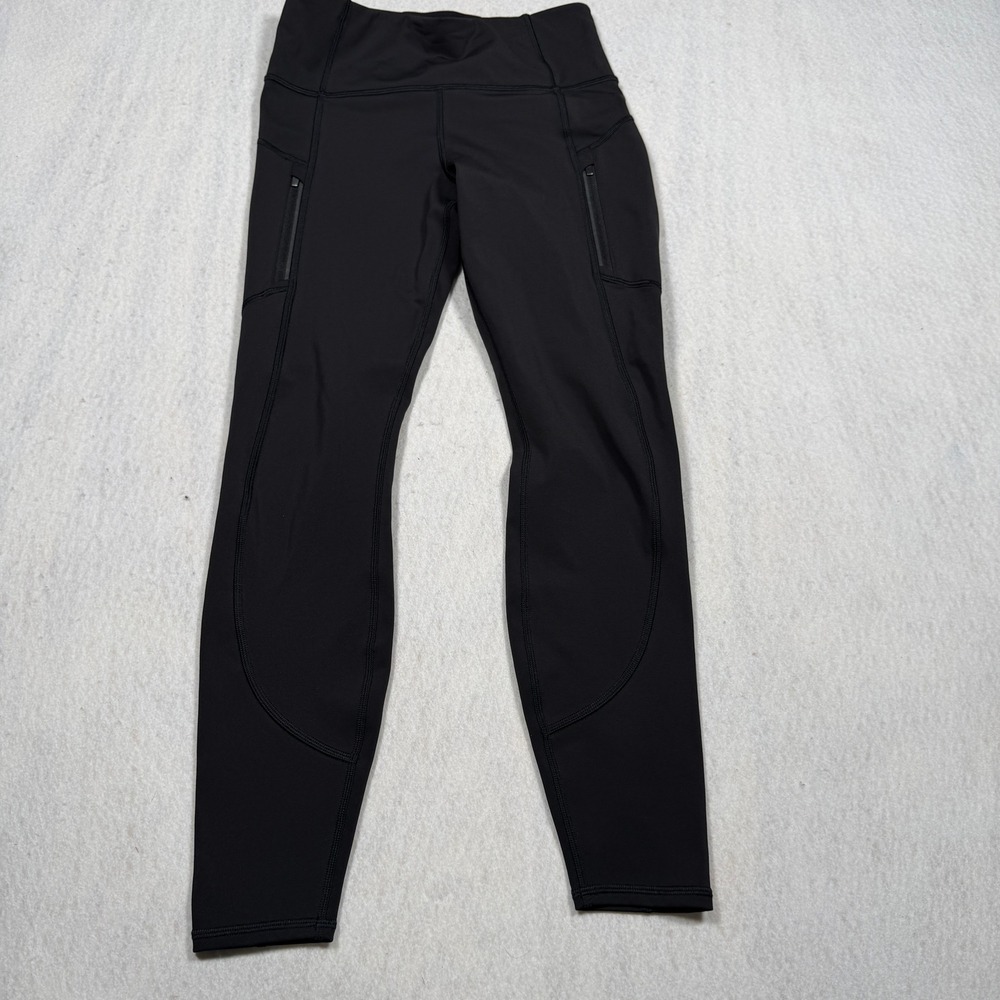 Athleta Rainier Tight Black Reflective Zipper Pocket Leggings Cold Weather